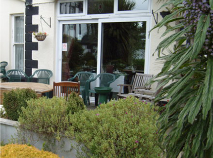 You can site outside on a sunny evening and enjoy the garden at Tudor court falmouth